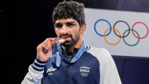 Aman Sehrawat's Weight Flop Costs Him Spot at Wrestling Worlds
OR
Weight Mishap Ousts Aman Sehrawat from Wrestling World Championships
OR
Indian Wrestling Hopeful Sehrawat Disqualified from Worlds After Weight Test Failure