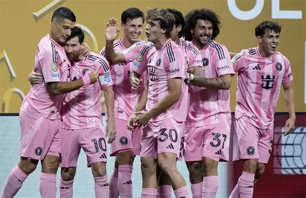 Messi and Suarez celebrating a goal for Inter Miami